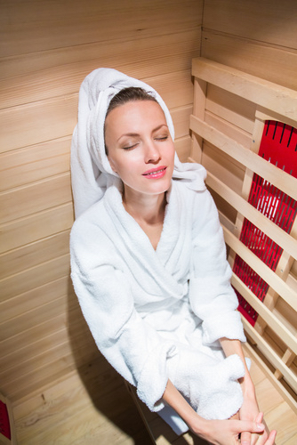 Infrared sauna lady in robe
