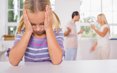 angry parents in front if kids