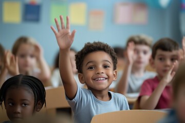boy in school raising hand