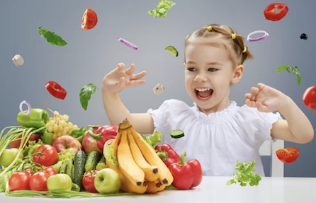 Girl with flying produce